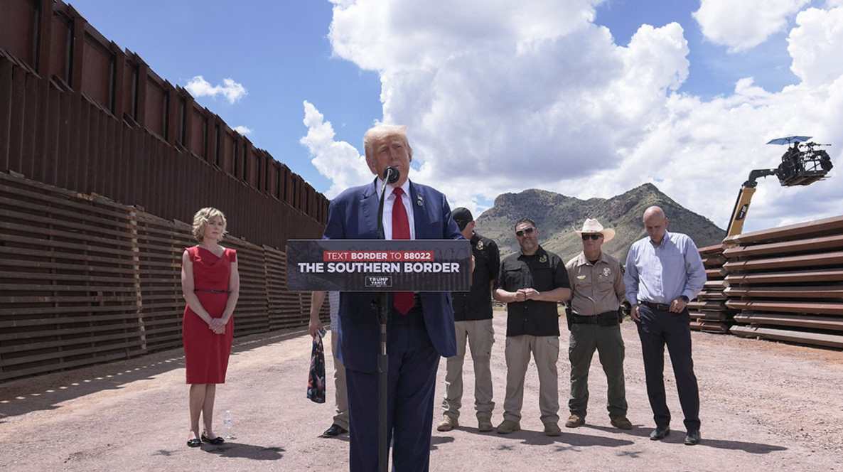 Which high-stakes construction project defined Trump's border security strategy?