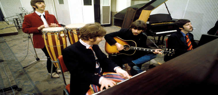 Which 1967 studio masterpiece fused rock with sitars and symphonies to redefine the LP?