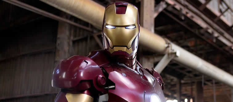 What's the real name of the billionaire genius behind the Iron Man suit?