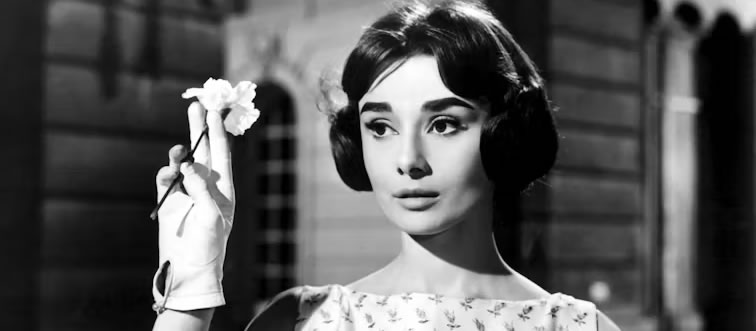 Can you identify the face that redefined silver-screen elegance?